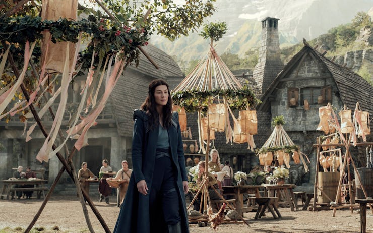 Rosamund Pike in a dark blue dress in a scene from Wheel of Time season 1