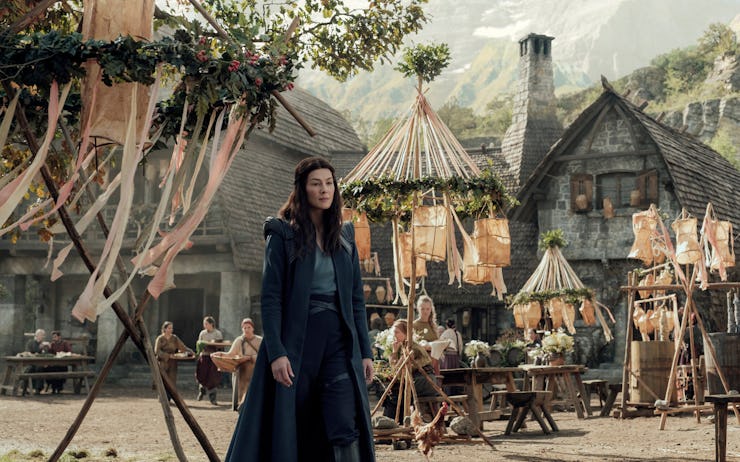 Rosamund Pike in a dark blue dress in a scene from Wheel of Time season 1 