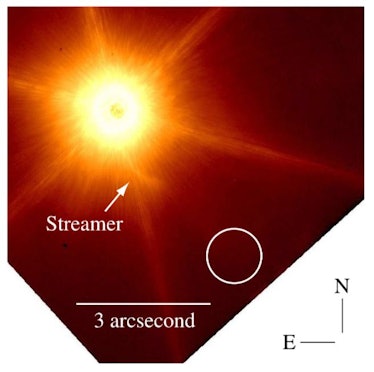 This is a Keck Telescope image of Z CMa from 2005 showing the streamer. The team interpreted the poi...
