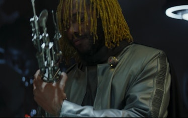 Thundercat swapping out his cyborg hand for another tool.