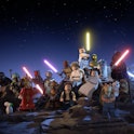 Image of Lego Star Wars characters posing together with light sabers and guns.