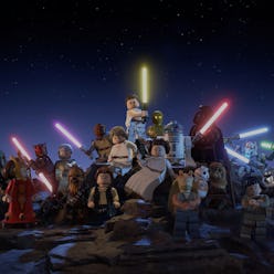 Image of Lego Star Wars characters posing together with light sabers and guns.