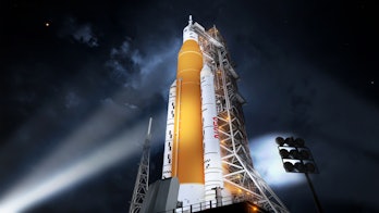 NASA's Space Launch Systems (SLS) rocket against a dark sky