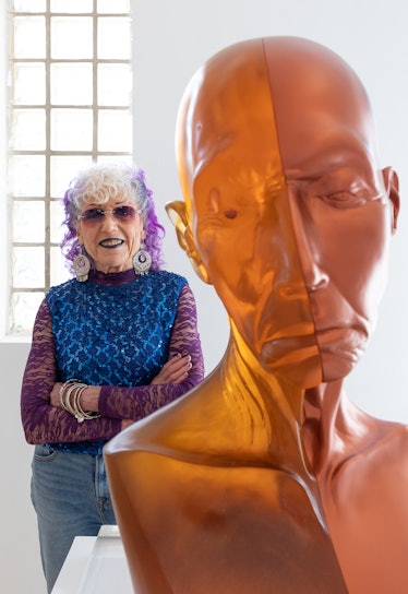 Judy Chicago, with her sculpture "Grand Toby Head With Copper Eye," 2010 at Nina Johnson Gallery in ...