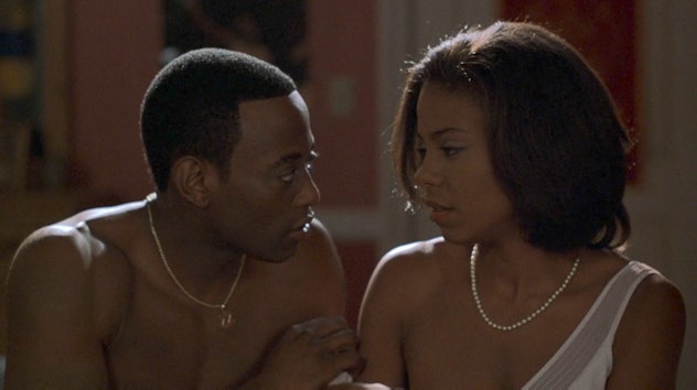 Monica and Quincy gaze at each other in Love & Basketball