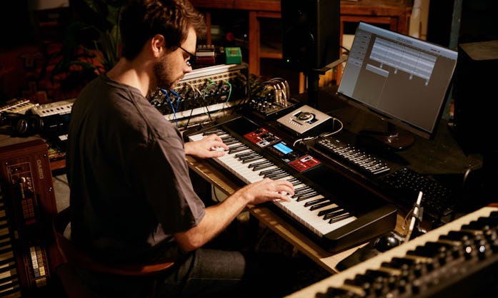 Guy using Casio's Casiotone CT-S1000V keyboard