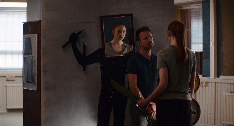 Trent (Aaron Paul) helps train Sarah (Karen Gillan) to defeat her clone in Dual.