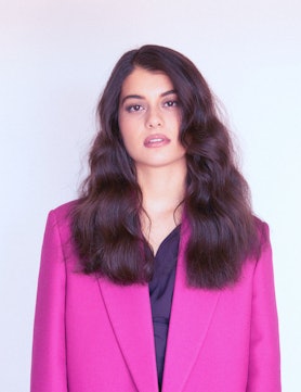 sofia black d'elia wearing an oversized pink blazer