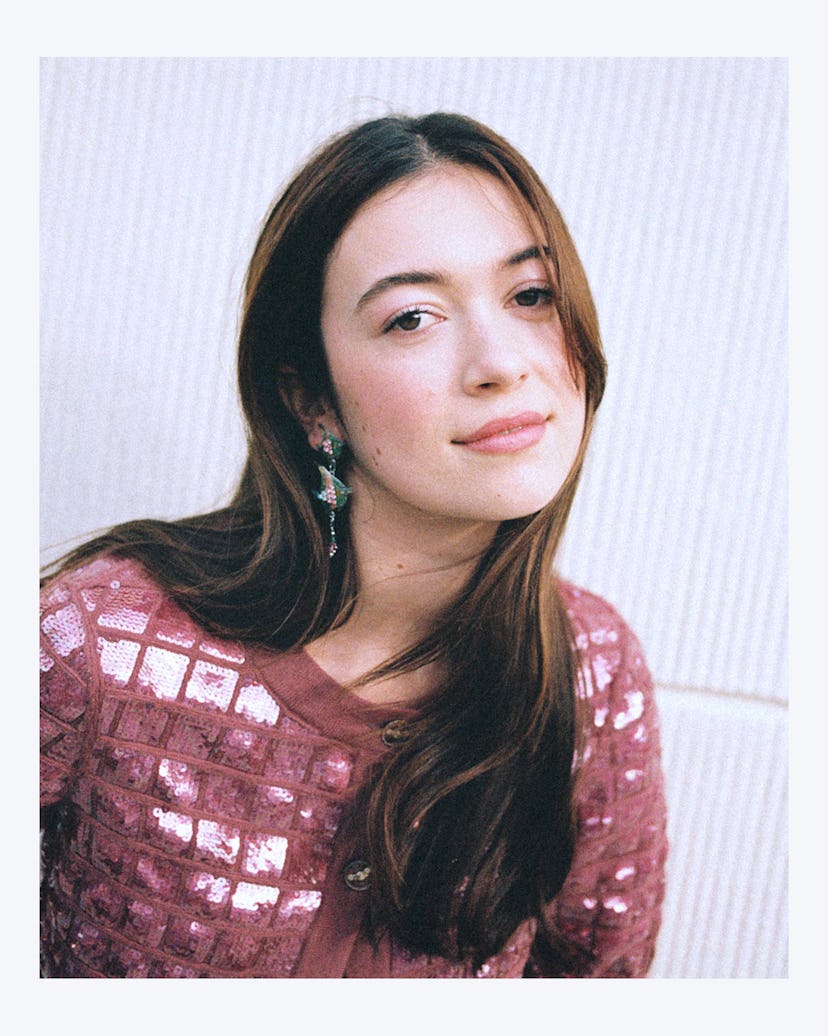 Grace Kaufman wearing shiny pink dress