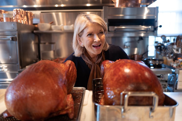 Martha Stewart with two turkeys