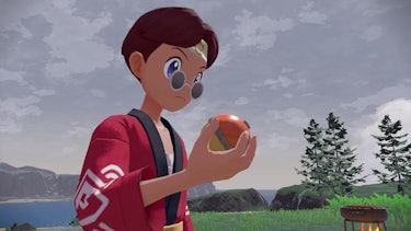 Pokémon trainer holding a Pokéball
