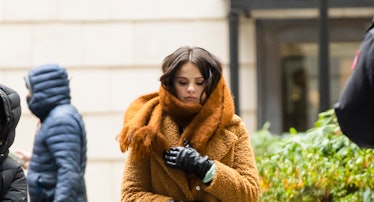 Selena Gomez bundling up on the set of Only Murders in the Building season 2