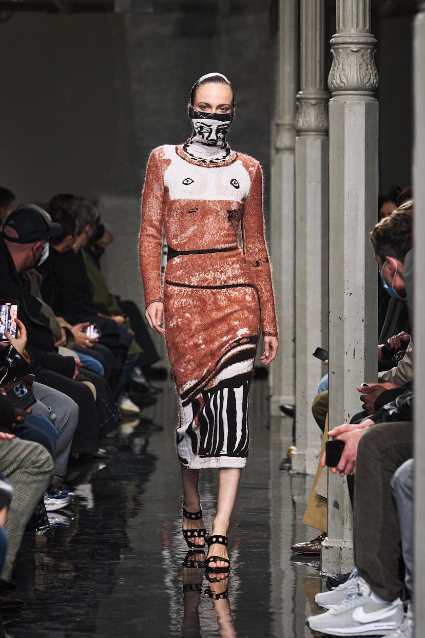 Model in knit Picasso dress at Alaïa fall 2022 runway show