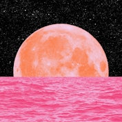 An orange moon rising behind a pink sea amid Venus retrograde 2022 ending on Jan. 29.