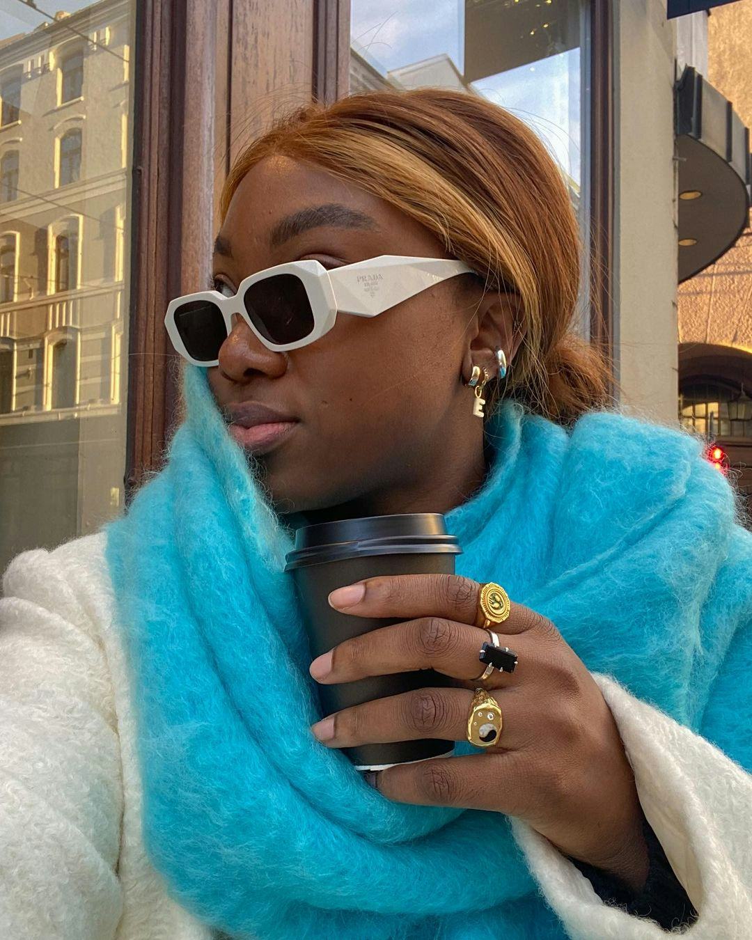 Nnenna Echem wears gold rings.