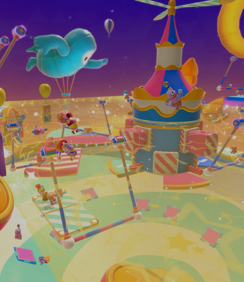 Image of Fall Guys game, showing a colorful obstacle course that resembles a circus carousel.