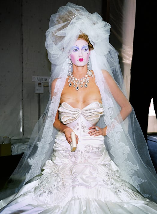 a model wearing a dress by John Galliano for Dior