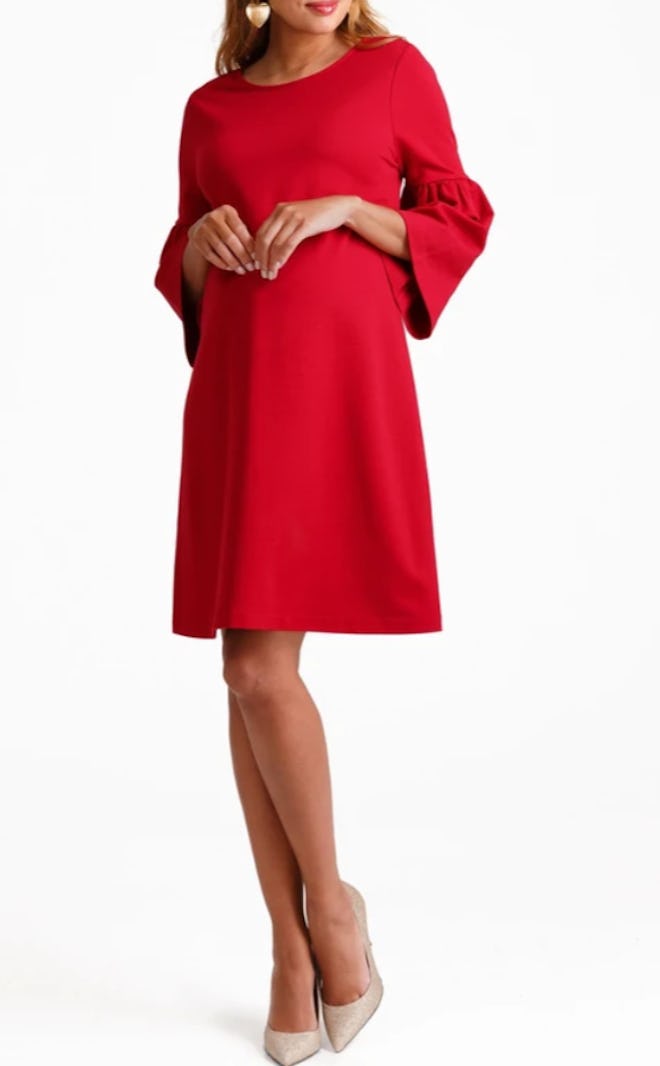 Pregnant woman modeling red dress