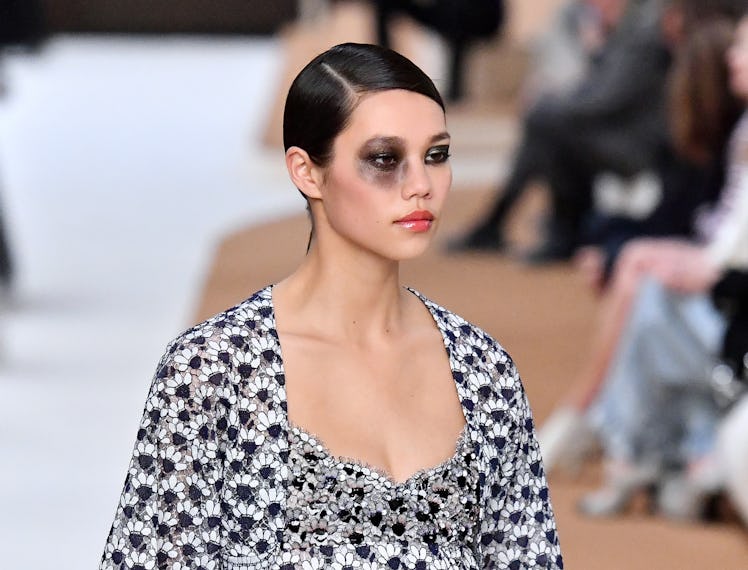 Black makeup on Chanel model