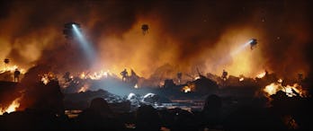 Imperial droids scouring the wreckage of a destroyed Mandalorian city in The Book of Boba Fett Episo...
