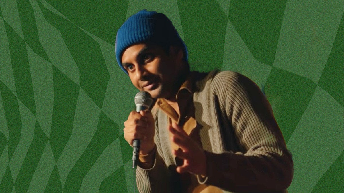 Aziz Ansari visage heureux