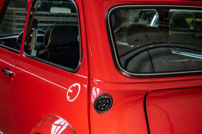 View of the charging port that replaces the fuel tank with the converted classic Mini 