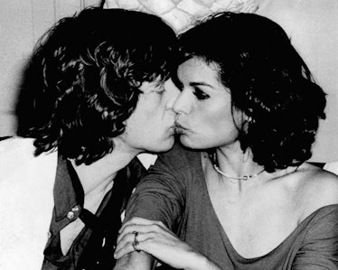 Mick and Bianca Jagger kissing