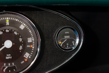 A look at a converted electric Mini's dashboard that shows range instead of fuel.