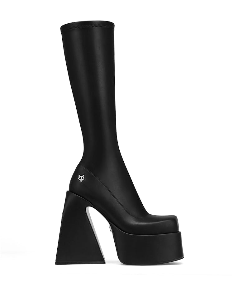 NAKED WOLFE black platform boots.