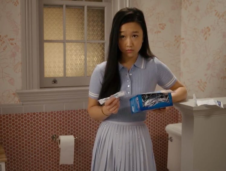Lily holding a box of tampons in And Just Like That episode 9