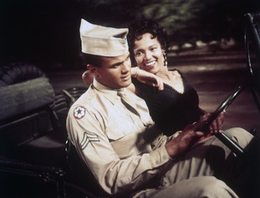 Harry Belafonte driving, Dorothy Dandridge next to him in the passenger seat