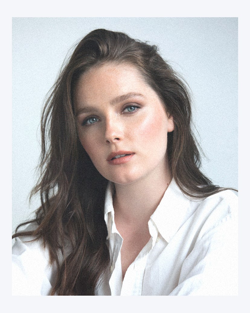 the actress amy forsyth wearing a white button down shirt