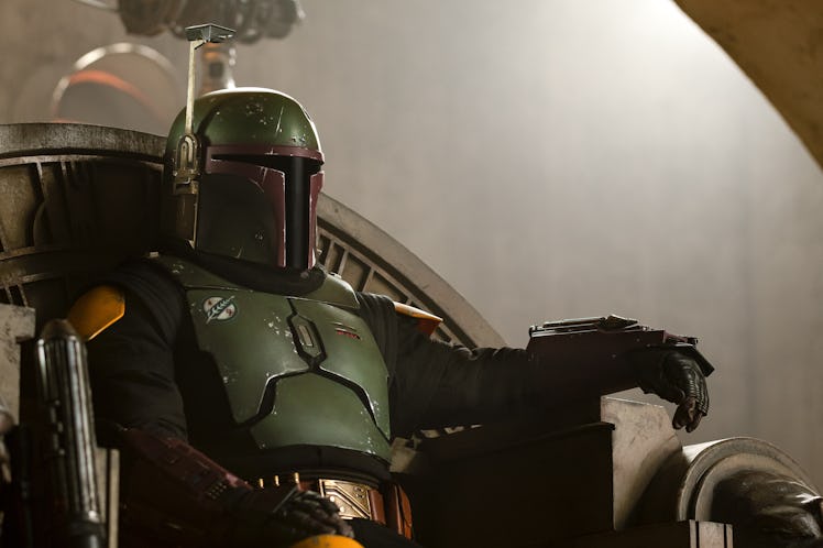 Boba Fett sitting on his throne in Jabba the Hutt's palace