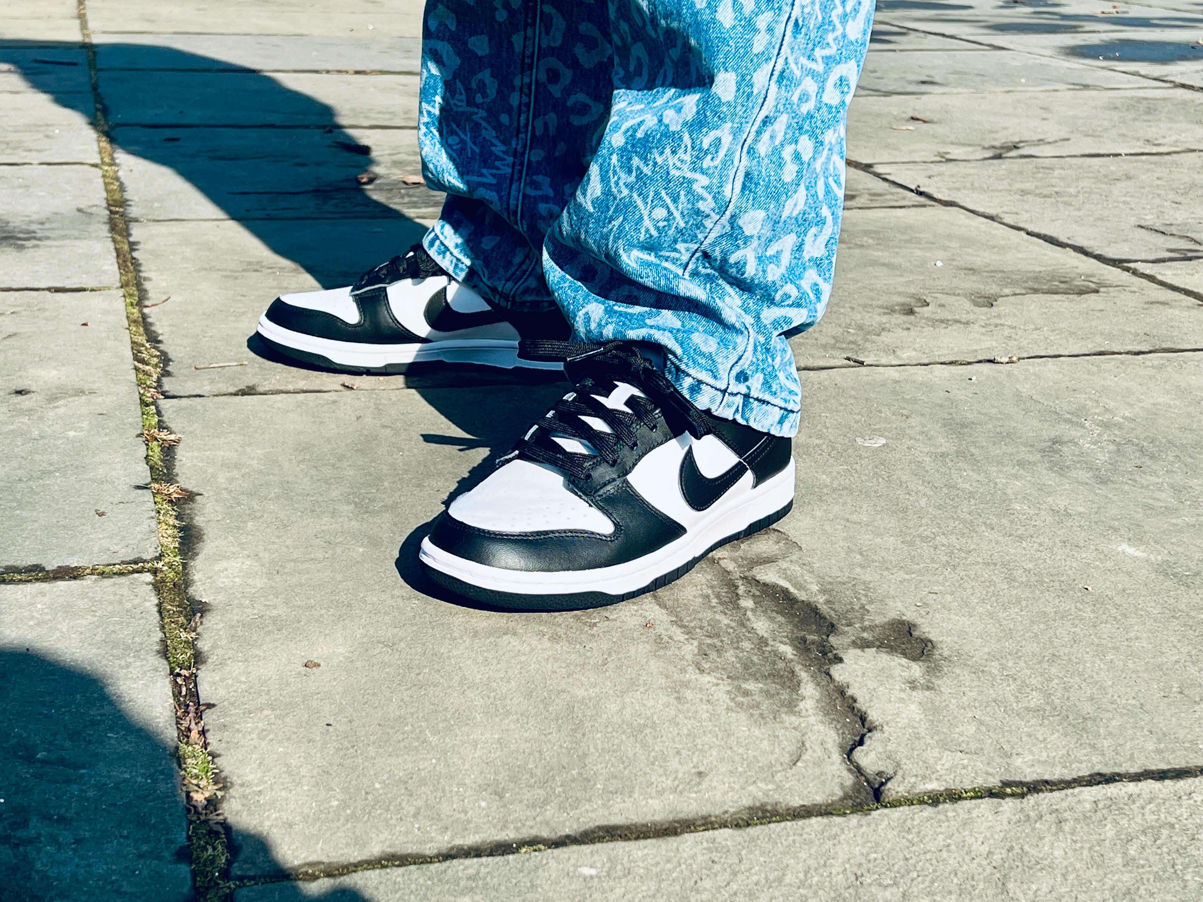 nike dunk black and white on feet