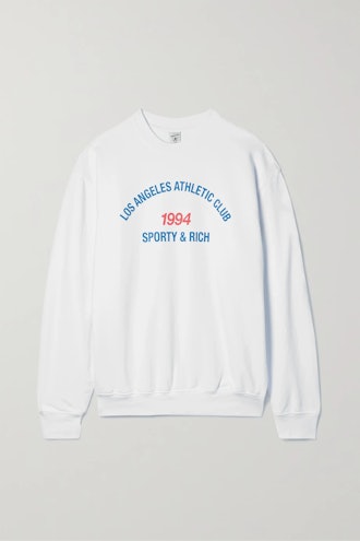 Sporty & Rich white crewneck sweatshirt.