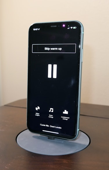 An iPhone 11 showing the Tempo Move's settings during a workout.