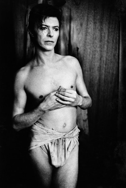 David Bowie wearing a loincloth, backstage at The Elephant Man