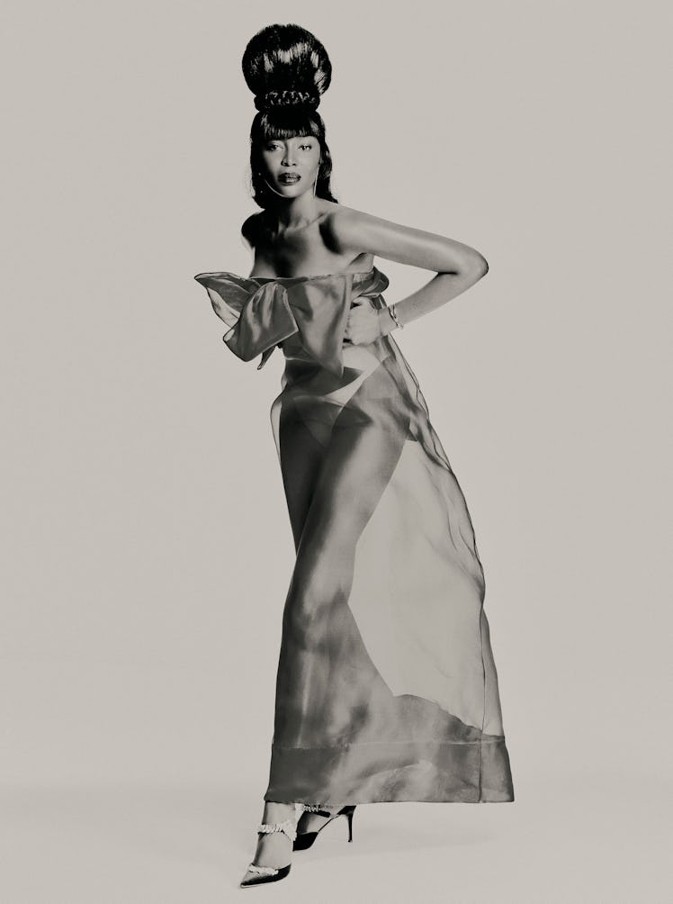 Dior dress; Rodarte bodysuit; Tiffany & Co. earrings and bracelet; Manolo Blahnik shoes.