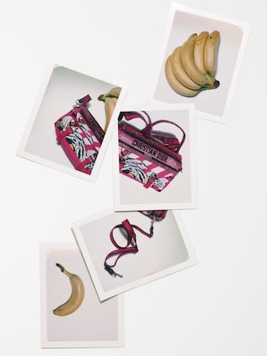 A pink Dior bag among bananas.
