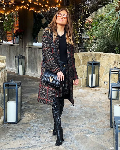 Jennifer Lopez wearing Coach bag.