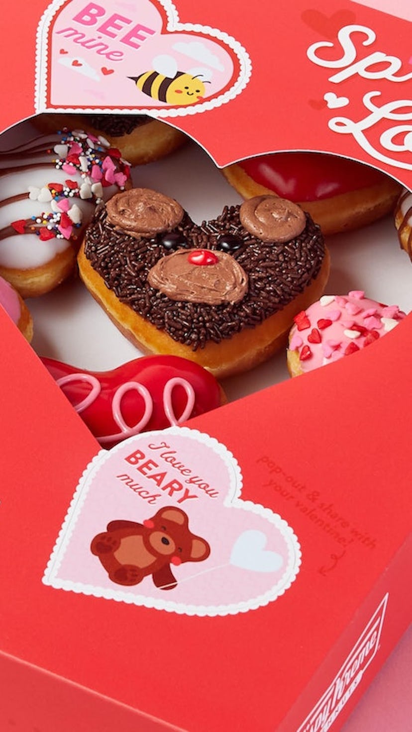 Krispy Kreme's Valentine's Day 2022 doughnut collection features four doughnuts with bear and bee de...