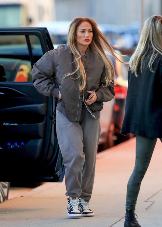 Jennifer Lopez wearing a bomber jacket from & Other Stories. 