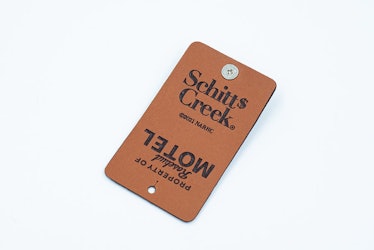 This garment tag is part of the 'Schitt's Creek' knitting collection from Lion Brand Yarn.