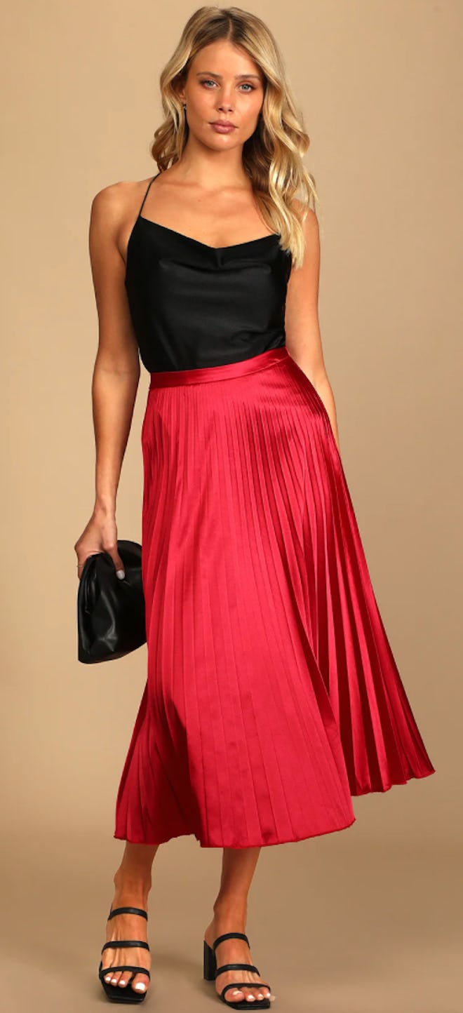 A red pleated skirt is a great choice for a Valentine's Day outfit.