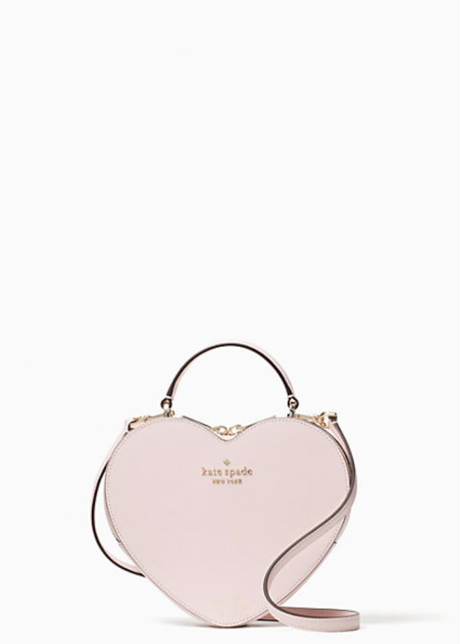 Carry this heart-shaped purse as part of your Valentine's Day outfit.