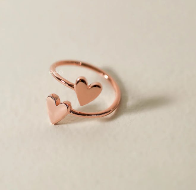 This minimalist heart ring will look pretty as part of a Valentine's Day outfit.