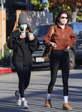 Kendall Jenner wearing Ugg mini boots. 