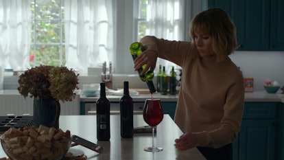 Kristen Bell with wine in 'The Woman In The House Across The Street From The Girl In The Window'