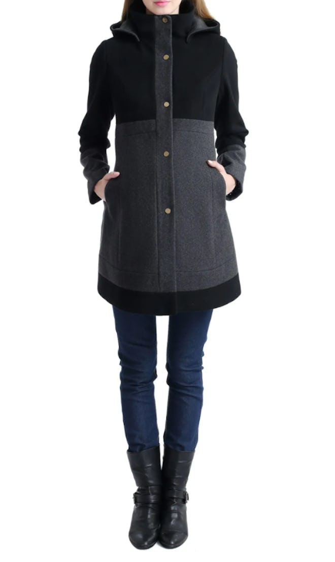 Pregnant woman modeling wool coat