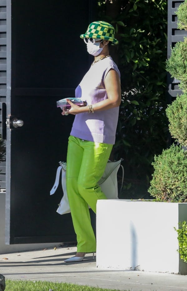 Rihanna wears Memorial Day green crochet bucket hat.